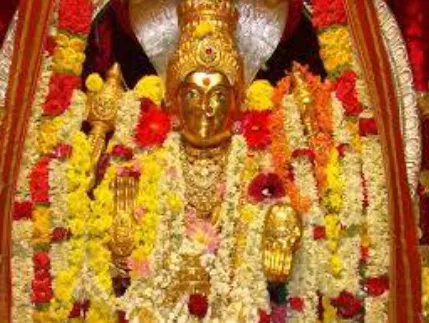 Annapoorneshwari Temple in Horanadu, Karnataka, beautifully lit and surrounded by lush hills